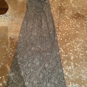 Maxi bugle bead special occasion dress w/criss cross open low back. Kay Unger